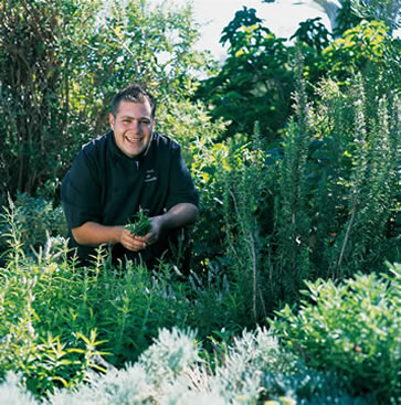 Executive Chef Roberto de Carvalho in his fynbos kitchen garden at Twelve Apostles Hotel and Spa