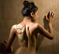 LI'TYA Organic Spa, handprint on girl's back