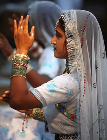 India, Udaipur, Taj Lake Palace Hotel, dancers, photographer Steven Hummel